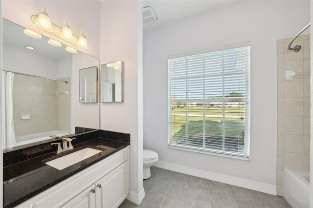 6518 Paw Pl, Land O Lakes, FL 34639 - full bathroom featuring shower / tub combo, vanity, toilet, and visible vents