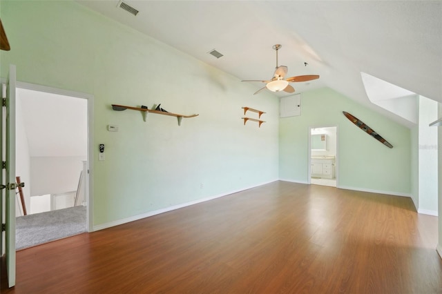 6518 Paw Pl, Land O Lakes, FL 34639 - interior space with ceiling fan, vaulted ceiling, wood finished floors, and visible vents