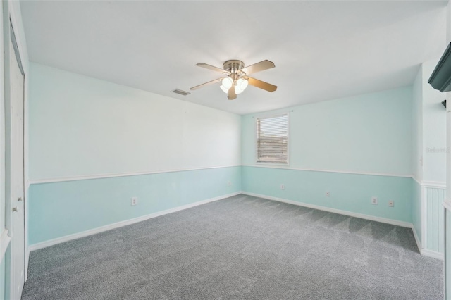 6518 Paw Pl, Land O Lakes, FL 34639 - carpeted spare room with baseboards, visible vents, and a ceiling fan
