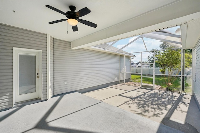 6518 Paw Pl, Land O Lakes, FL 34639 - unfurnished sunroom with a ceiling fan