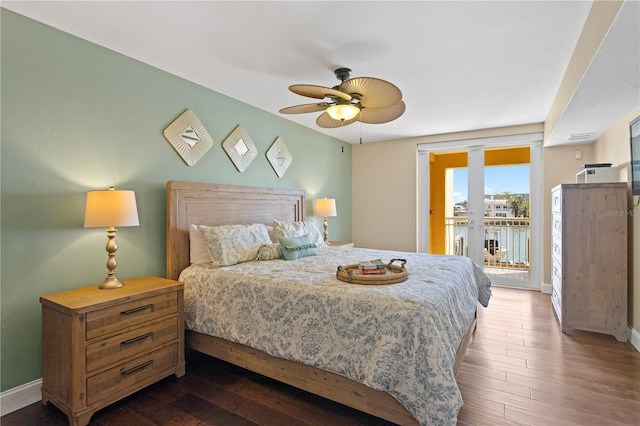 5353 Gulf Blvd Unit B103, St Pete Beach, FL 33706 - bedroom featuring access to outside, dark wood finished floors, and baseboards
