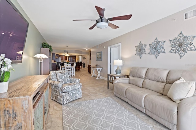 5353 Gulf Blvd Unit B103, St Pete Beach, FL 33706 - living area featuring ceiling fan