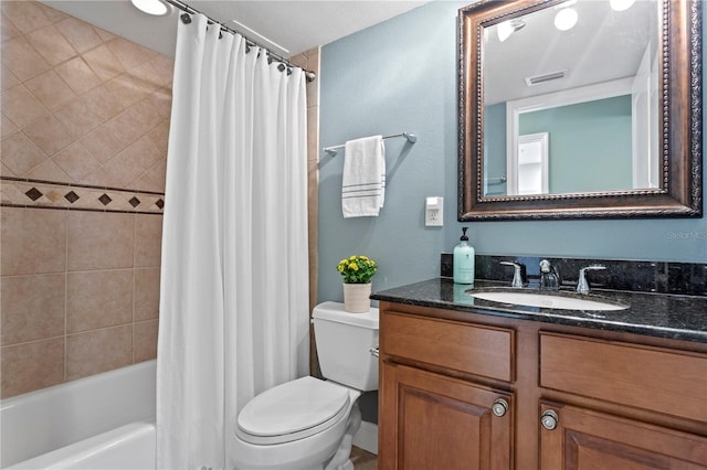 5353 Gulf Blvd Unit B103, St Pete Beach, FL 33706 - bathroom featuring toilet, vanity, and shower / tub combo