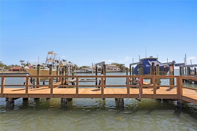 5353 Gulf Blvd Unit B103, St Pete Beach, FL 33706 - dock with boat lift and a water view
