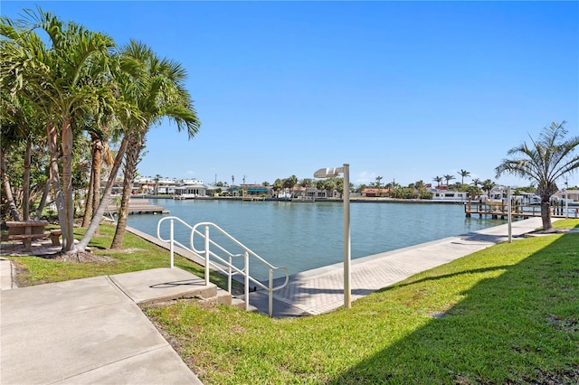 5353 Gulf Blvd Unit B103, St Pete Beach, FL 33706 - dock with a lawn and a water view