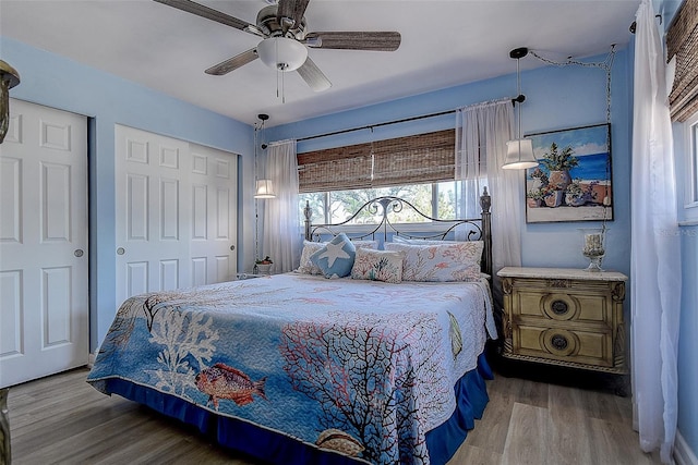 5931 33rd Ave N, Saint Petersburg, FL 33710 - bedroom with ceiling fan and wood finished floors