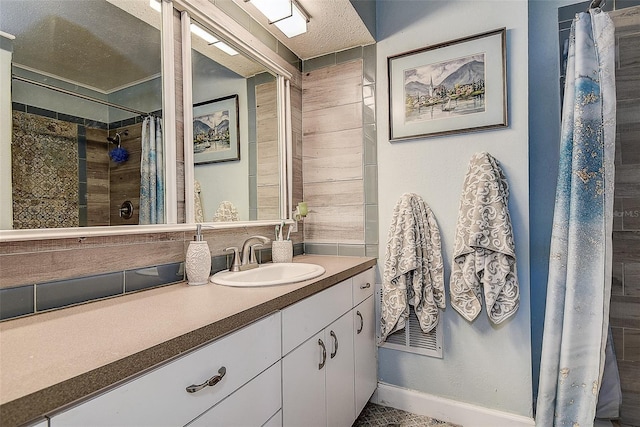 5931 33rd Ave N, Saint Petersburg, FL 33710 - bathroom with baseboards, a shower with curtain, vanity, and a textured ceiling