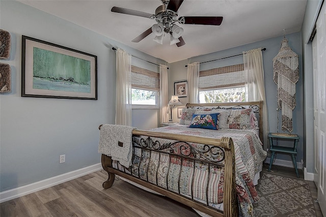 5931 33rd Ave N, Saint Petersburg, FL 33710 - bedroom featuring wood finished floors, baseboards, and ceiling fan