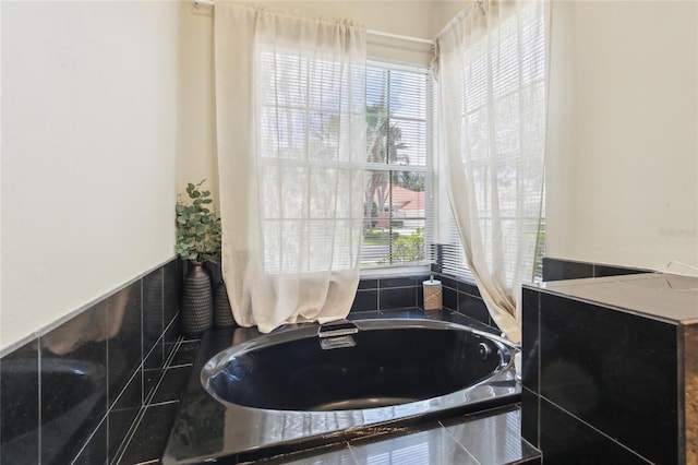 full bathroom with a garden tub