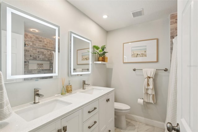 bathroom with visible vents, a sink, marble finish floor, and toilet