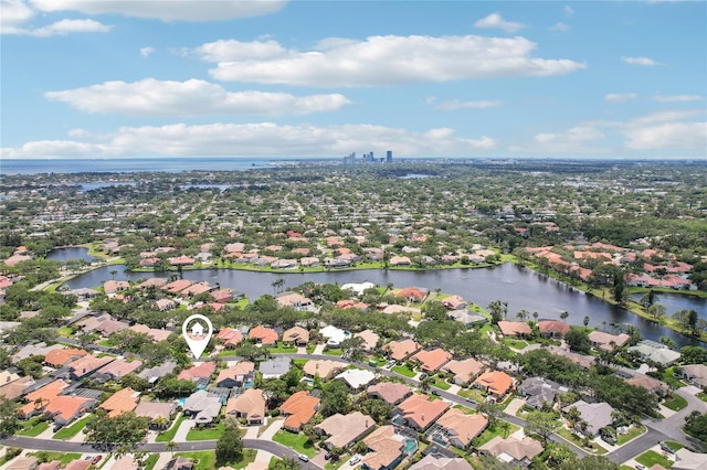birds eye view of property featuring a residential view and a water view