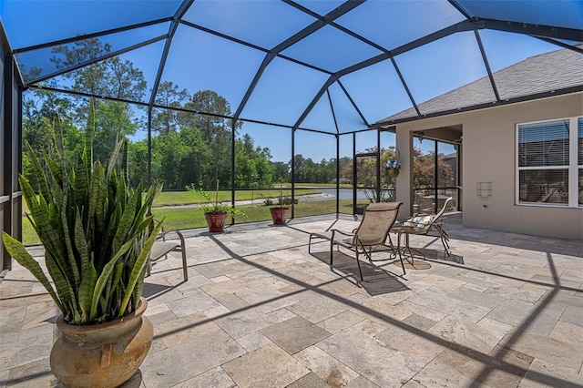27318 Sora Blvd, Wesley Chapel, FL 33544 - view of patio / terrace featuring glass enclosure