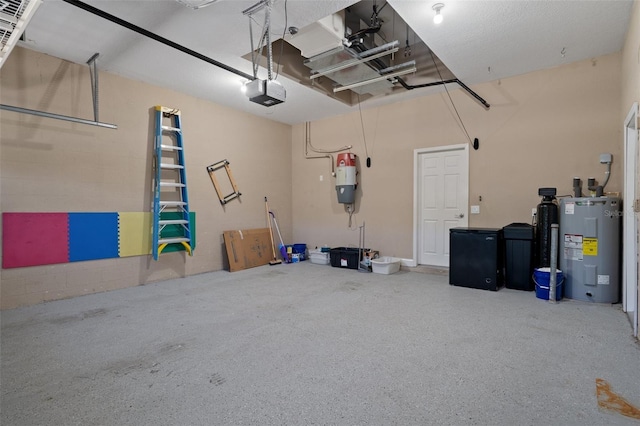 27318 Sora Blvd, Wesley Chapel, FL 33544 - garage featuring electric water heater and a garage door opener