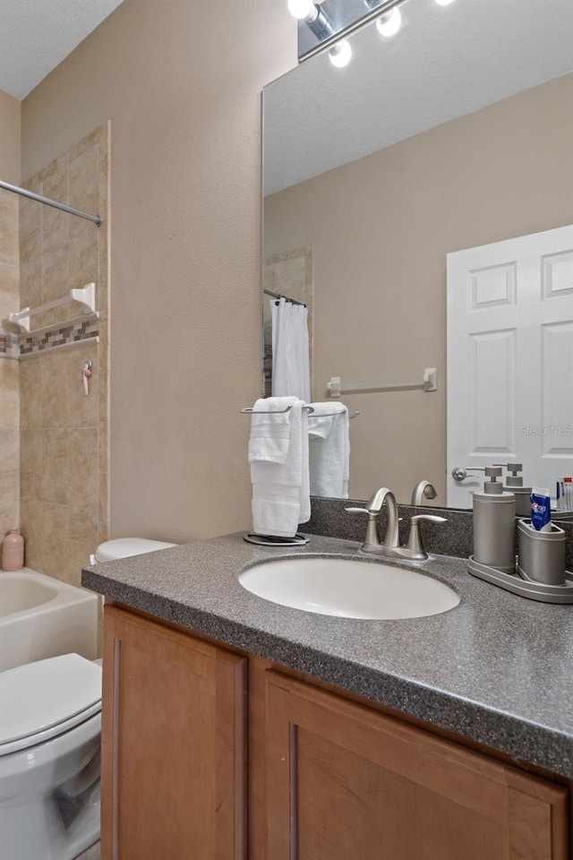 27318 Sora Blvd, Wesley Chapel, FL 33544 - bathroom with shower / bath combination with curtain, vanity, and toilet
