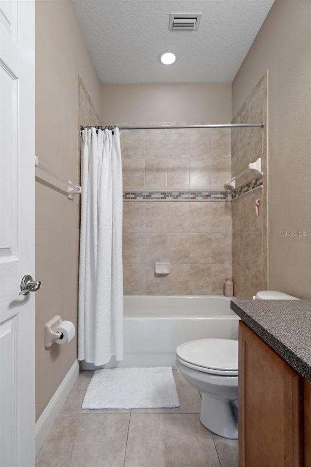 27318 Sora Blvd, Wesley Chapel, FL 33544 - bathroom with vanity, tile patterned floors, shower / tub combo with curtain, toilet, and visible vents