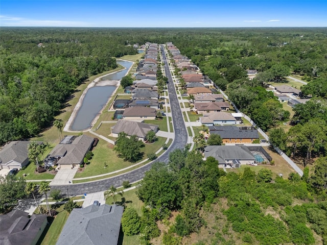 27318 Sora Blvd, Wesley Chapel, FL 33544 - bird's eye view with a residential view, a forest view, and a water view