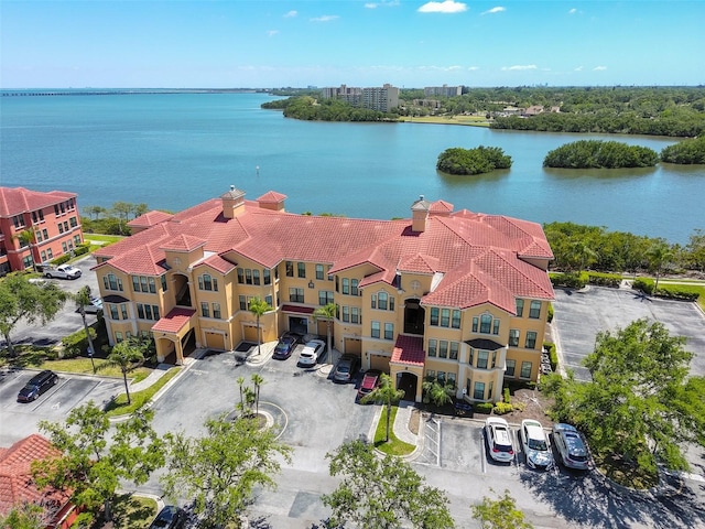 drone / aerial view with a water view