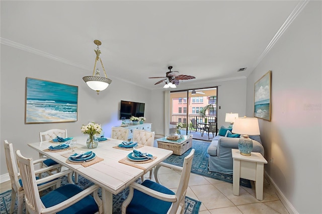 2739 Via Capri Unit 1024, Clearwater, FL 33764 - dining space featuring ornamental molding, light tile patterned floors, and ceiling fan