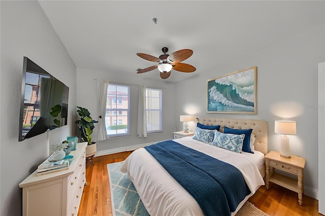 2739 Via Capri Unit 1024, Clearwater, FL 33764 - bedroom featuring light wood-style floors and a ceiling fan