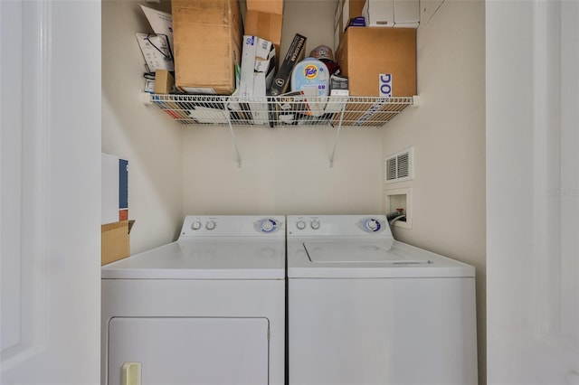 2739 Via Capri Unit 1024, Clearwater, FL 33764 - washroom with separate washer and dryer