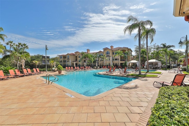 2739 Via Capri Unit 1024, Clearwater, FL 33764 - community pool with a patio area