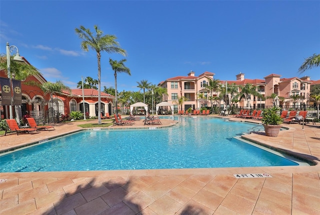 2739 Via Capri Unit 1024, Clearwater, FL 33764 - community pool with a patio