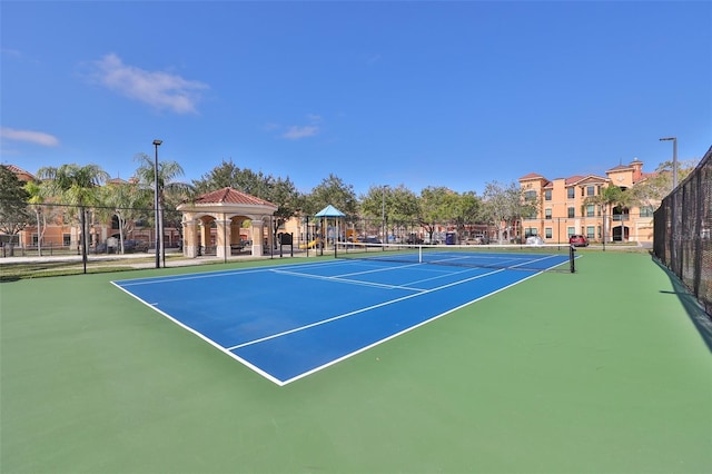 2739 Via Capri Unit 1024, Clearwater, FL 33764 - view of tennis court featuring a gazebo