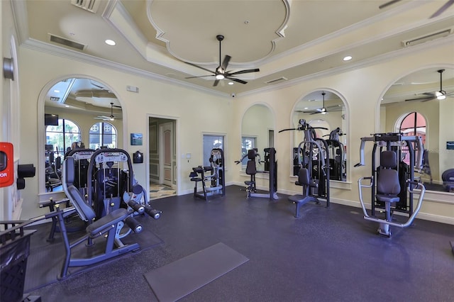 2739 Via Capri Unit 1024, Clearwater, FL 33764 - exercise room with ceiling fan, crown molding, arched walkways, recessed lighting, and a tray ceiling