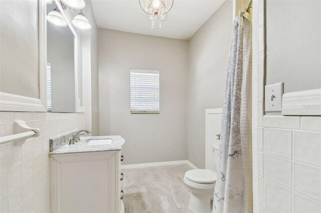 full bath featuring toilet and vanity