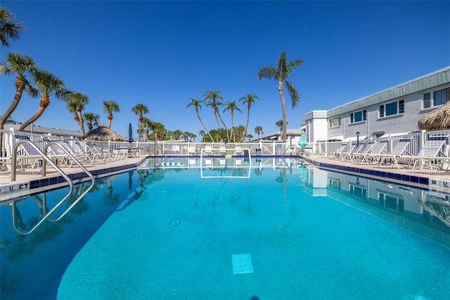 community pool featuring fence