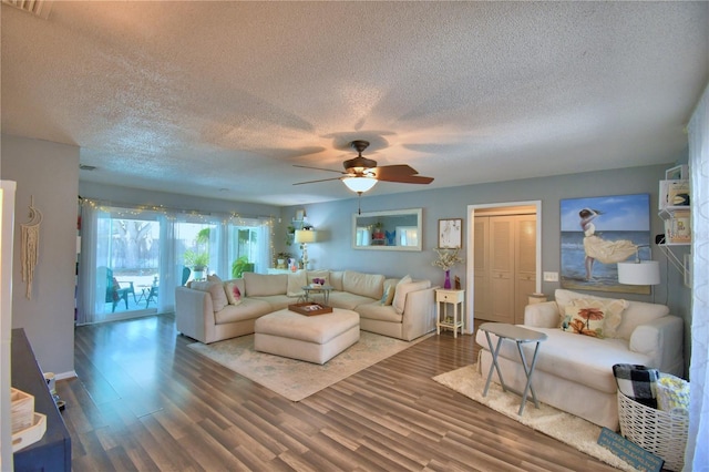 53 Paine Dr, Winter Haven, FL 33884 - living room featuring visible vents, a ceiling fan, wood finished floors, and a textured ceiling