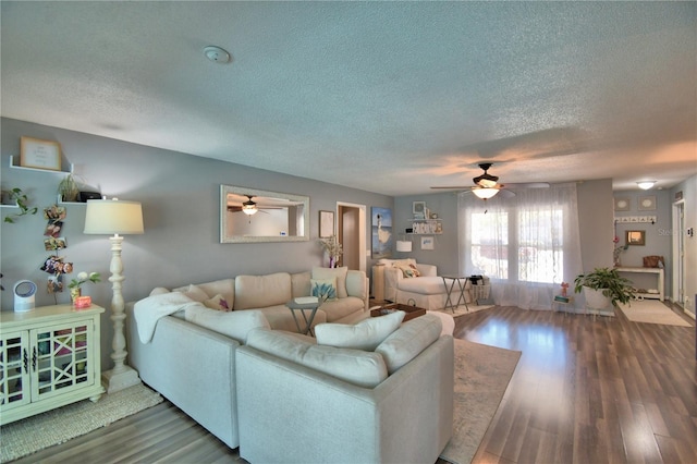 53 Paine Dr, Winter Haven, FL 33884 - living area featuring a ceiling fan, wood finished floors, and a textured ceiling