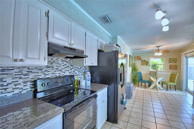 53 Paine Dr, Winter Haven, FL 33884 - kitchen with visible vents, under cabinet range hood, a textured ceiling, and black appliances
