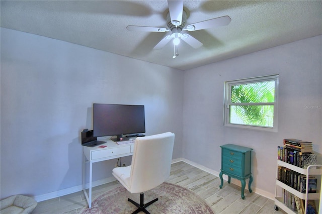 53 Paine Dr, Winter Haven, FL 33884 - office area with baseboards, a ceiling fan, wood finished floors, and a textured ceiling