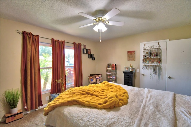 53 Paine Dr, Winter Haven, FL 33884 - carpeted bedroom with ceiling fan and a textured ceiling