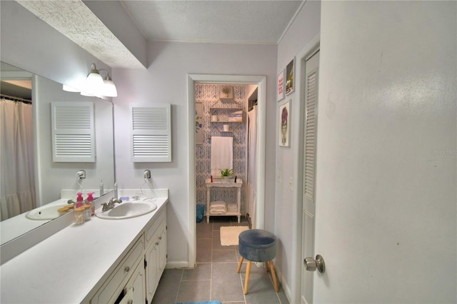 53 Paine Dr, Winter Haven, FL 33884 - bathroom with vanity, baseboards, tile patterned flooring, and a closet