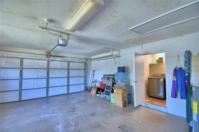 53 Paine Dr, Winter Haven, FL 33884 - garage featuring electric water heater and washer / clothes dryer