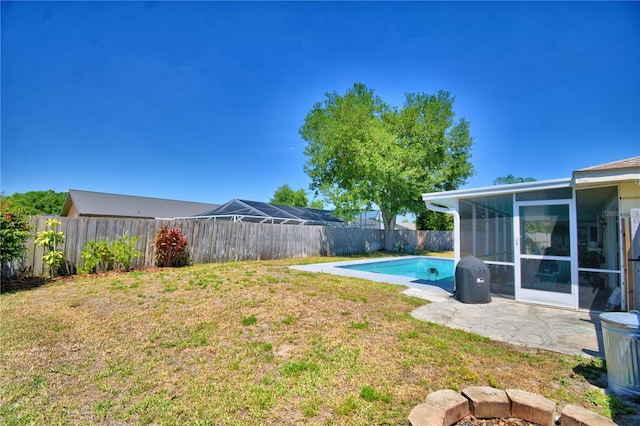 53 Paine Dr, Winter Haven, FL 33884 - view of yard with a fenced backyard, a sunroom, and a patio