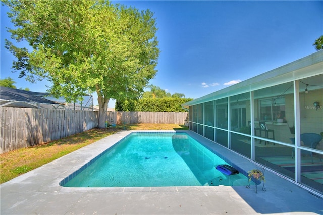 53 Paine Dr, Winter Haven, FL 33884 - view of swimming pool with a fenced backyard, a fenced in pool, and a sunroom