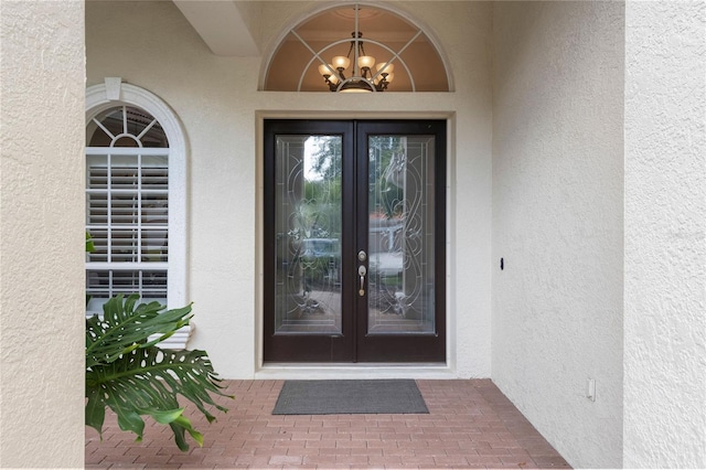 17206 Emerald Chase Dr, Tampa, FL 33647 - entrance to property featuring stucco siding and french doors