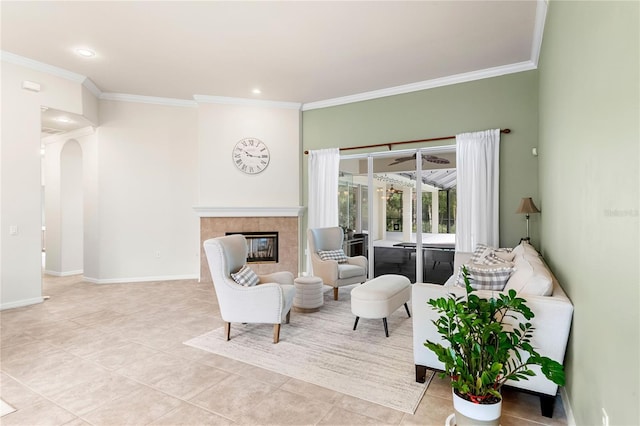 17206 Emerald Chase Dr, Tampa, FL 33647 - living area featuring crown molding, tile patterned flooring, a fireplace, recessed lighting, and baseboards