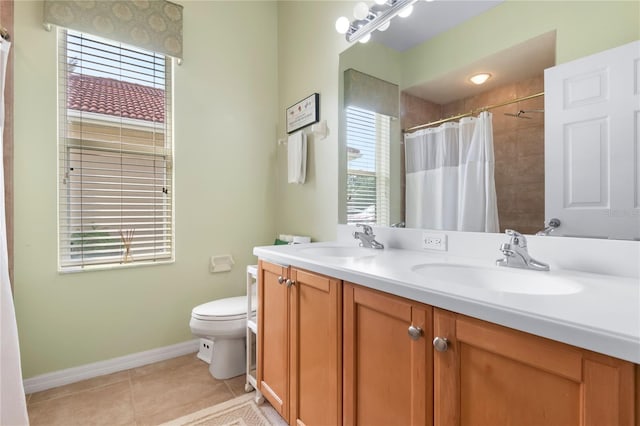 17206 Emerald Chase Dr, Tampa, FL 33647 - full bathroom featuring baseboards, a sink, tile patterned floors, and toilet