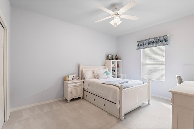17206 Emerald Chase Dr, Tampa, FL 33647 - bedroom with a ceiling fan, baseboards, and light carpet