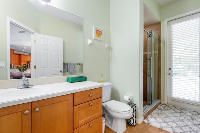 17206 Emerald Chase Dr, Tampa, FL 33647 - ensuite bathroom featuring vanity, toilet, connected bathroom, and a stall shower