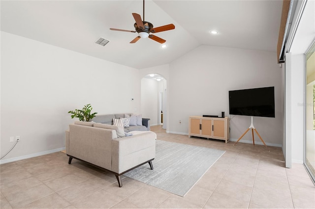 17206 Emerald Chase Dr, Tampa, FL 33647 - living room with a ceiling fan, visible vents, arched walkways, vaulted ceiling, and light tile patterned floors