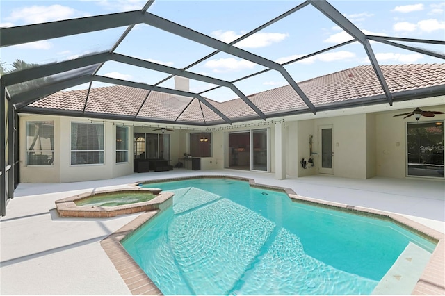 17206 Emerald Chase Dr, Tampa, FL 33647 - view of swimming pool with a ceiling fan, a pool with connected hot tub, and a patio area