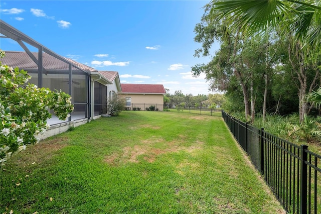 17206 Emerald Chase Dr, Tampa, FL 33647 - view of yard featuring glass enclosure and a fenced backyard