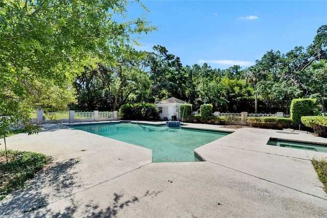 1603 Cottagewood Dr, Brandon, FL 33510 - pool with fence, a patio area, and an in ground hot tub