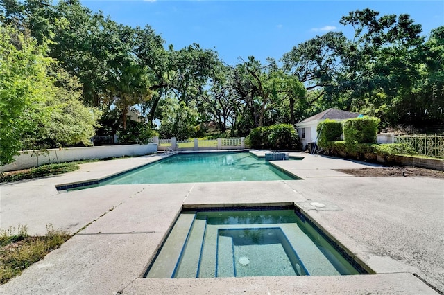 1603 Cottagewood Dr, Brandon, FL 33510 - view of swimming pool with fence, a patio area, a fenced in pool, and an in ground hot tub