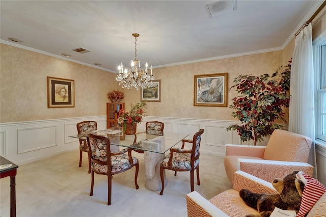 1603 Cottagewood Dr, Brandon, FL 33510 - dining space with visible vents, a notable chandelier, light colored carpet, and a decorative wall